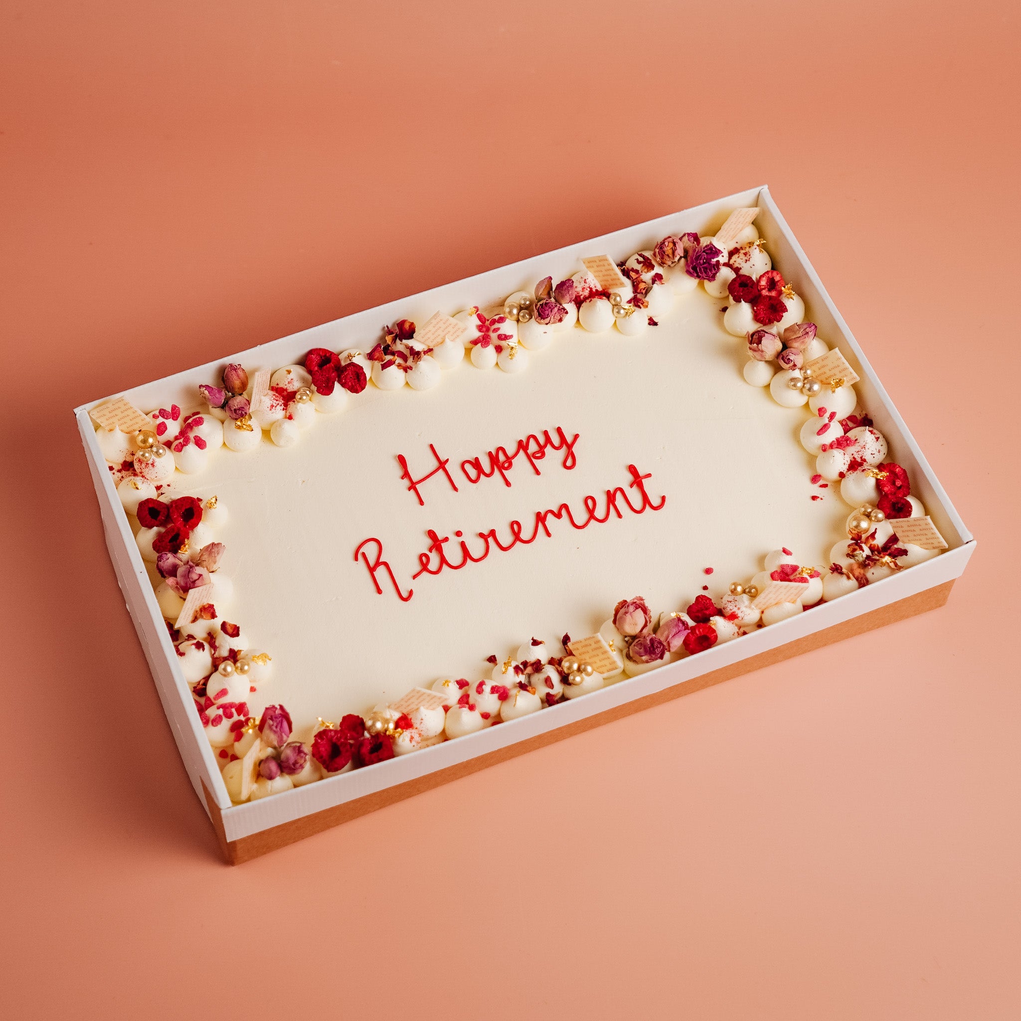 White Sheet Cake with rustic floral and rose decorations, with a personalised piped message &